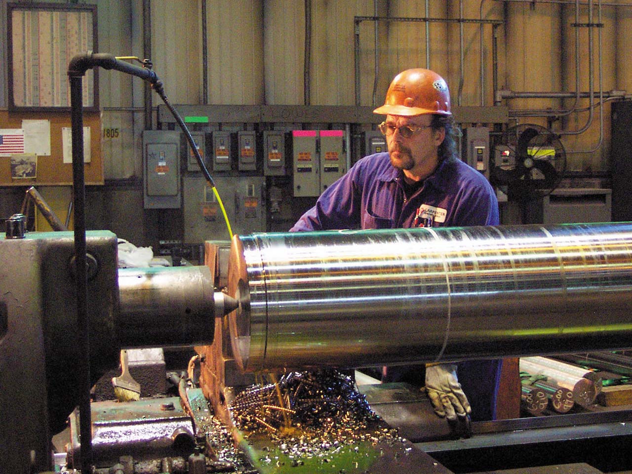 Steel worker in a factory.